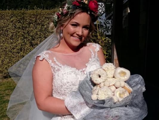 Photos: Bride Gets Married Holding Bouquet of Doughnuts