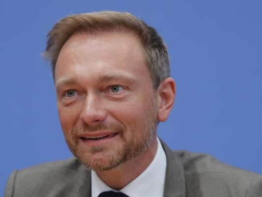 In change of tone, leader of German FDP calls Macron a 'godsend'