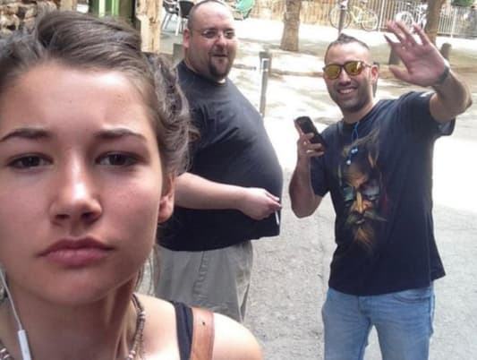 Photos: Woman Takes Selfies With Men Who Harass Her on Streets