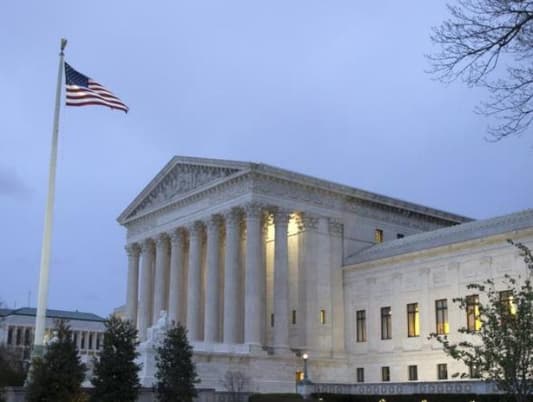 Supreme Court tosses one of two travel ban challenges