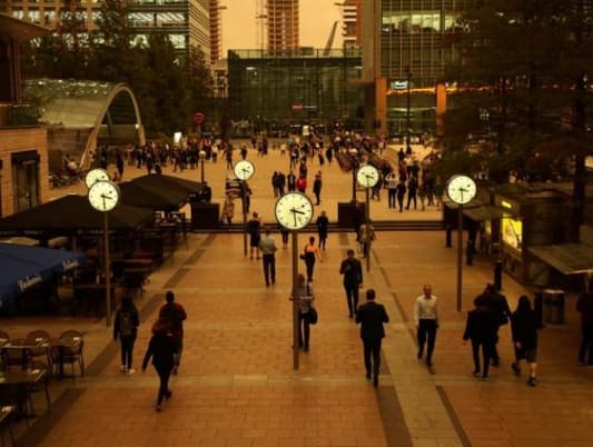 London sky turns yellow as storm blows in Saharan dust, Spanish smoke