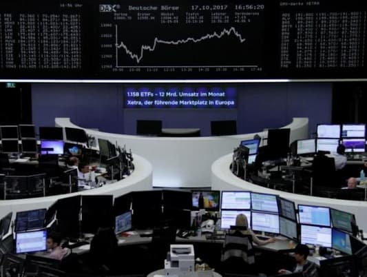 European shares rise as third-quarter earnings roll in