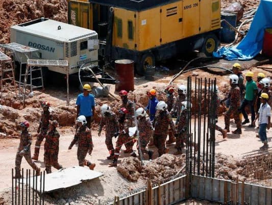 Death toll from Malaysia construction site landslide at 11