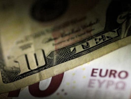 Dollar edges away from highs, Spain crisis pressures euro