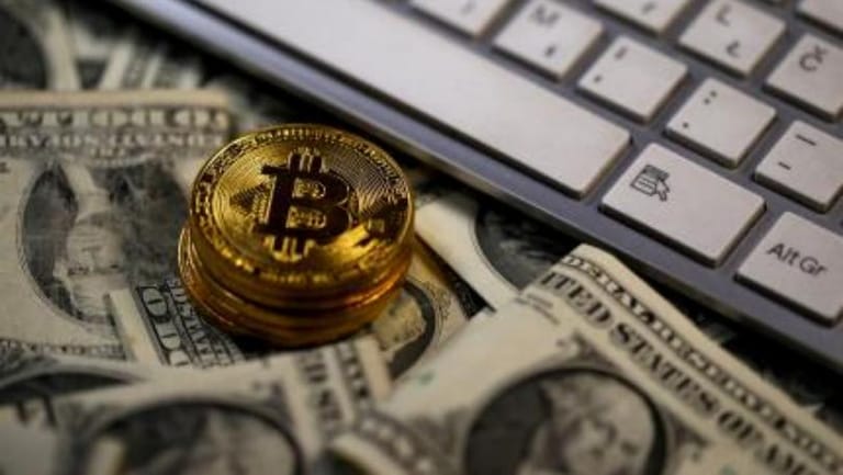 Bitcoin falls 30 percent, posts worst week since 2013
