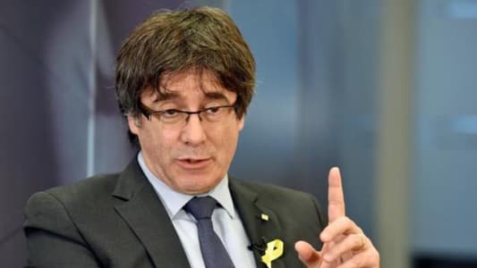 Let me come back, Catalan leader tells Spain