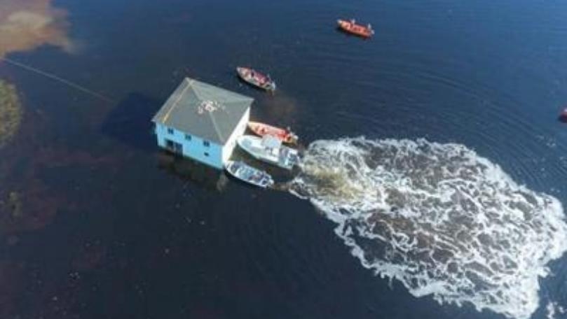 Photos: Canadian Couple Float Their 100-Year-Old Dream House to New Spot Across Bay