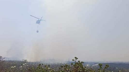 Civil Defense: A helicopter from the Lebanese Army Air Force has been deployed to help extinguish a fire that broke out in the vicinity of Qlayaat Airport in Akkar