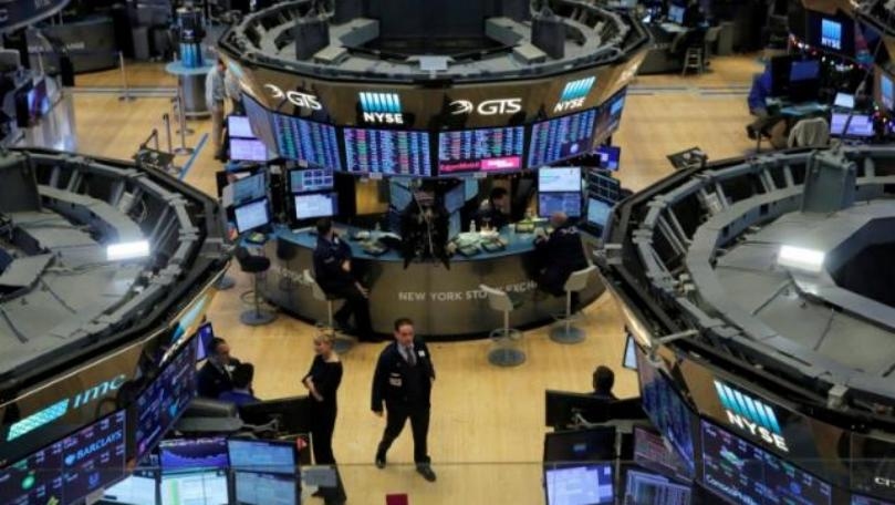 Wall Street slips after report China may slow U.S. bond purchases