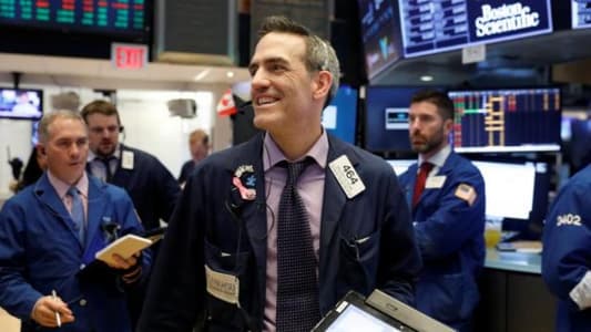 Wall Street slips as healthcare, energy stocks drag