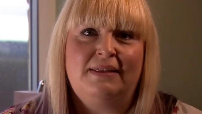 Children Found Lying in Bed with Husband's Dead Body