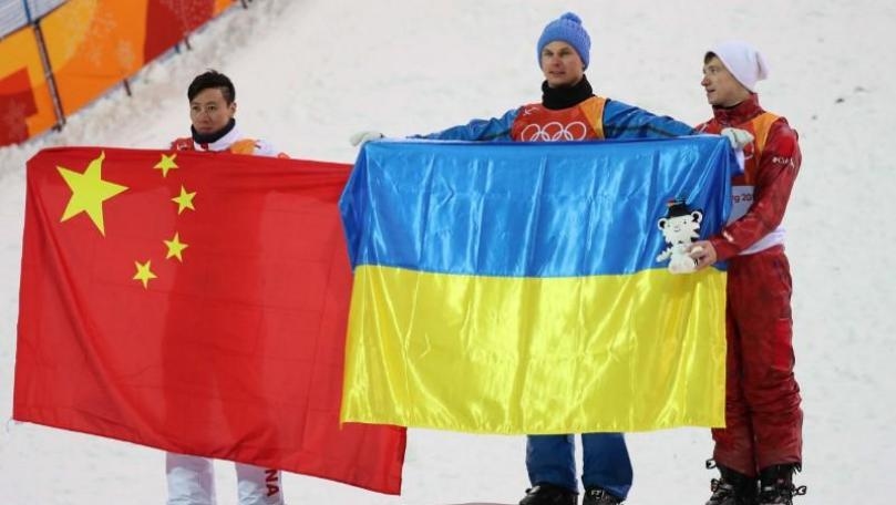 Freestyle skiing: Abramenko wins aerials gold after tense final