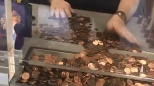 Woman Pays $493 Water Bill in Pennies in Protest at High Prices