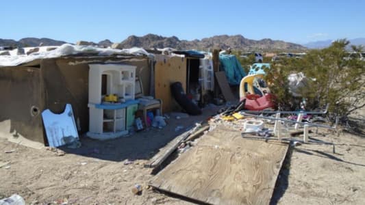 Three Children Found Living in Wooden Box in Desert