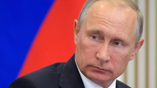 Putin, before vote, says Russia has thwarted hundreds of foreign spies