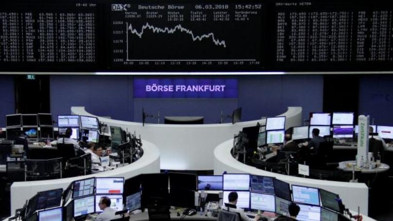 European shares edge down as trade fears make comeback