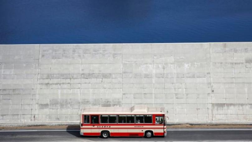 Seven years after tsunami, Japanese live uneasily with seawalls
