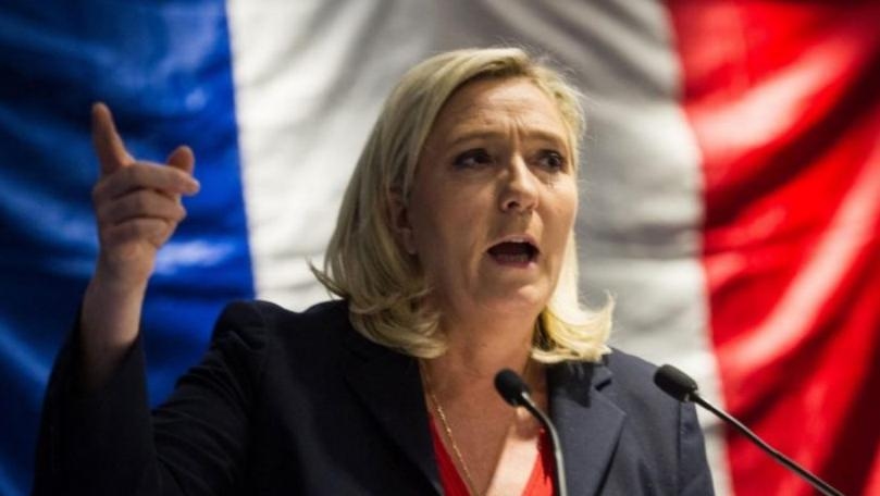 France's Le Pen threatens lawsuit in far-right party name dispute