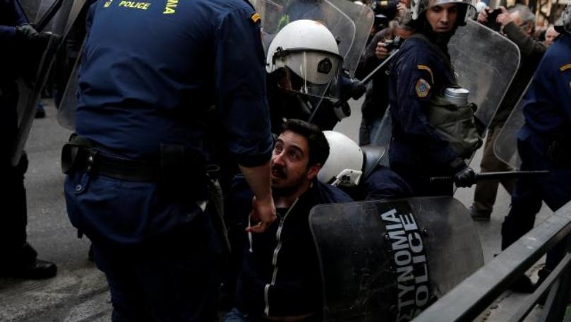 Greek protesters, police clash at property repossession auction