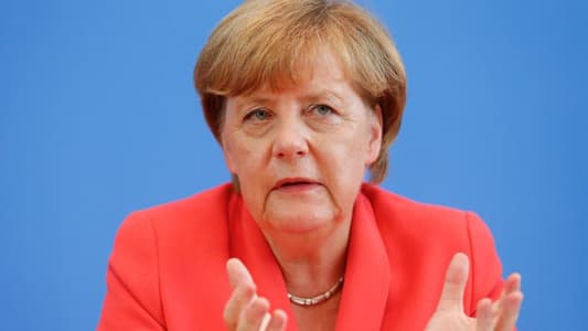 Merkel defends German trade surplus, says trying to boost domestic demand