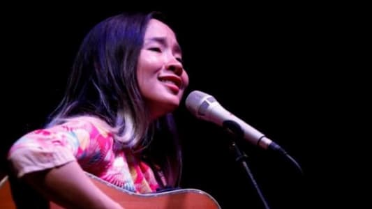 Vietnam briefly detains dissident singer after European tour