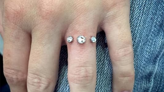 Couples Piercing Finger Instead of Wearing Engagement Ring