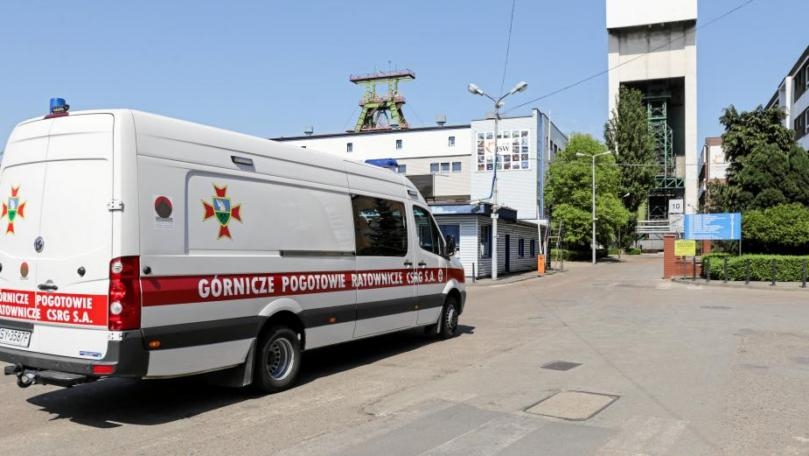 Polish rescuers battle to reach four miners trapped after quake