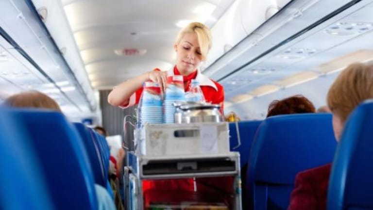 These Are the Best Times to Use the Airplane Restroom, According to a Flight Attendant