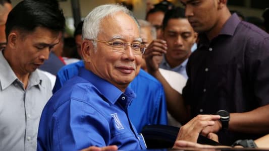 Police enter home of ousted Malaysian PM Najib