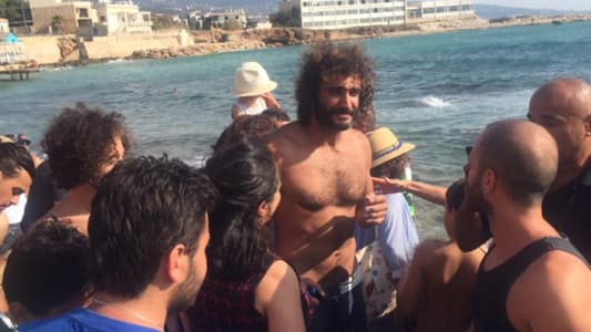 Jad Ghosn arrives at Batroun's 'Bahsa Bay' on a sailing board from Larnaca Port