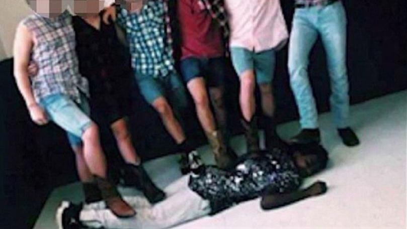 Six White Students Share Picture of Them Standing on Black Student