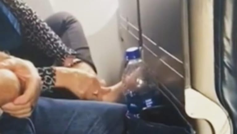 Passenger Secretly Films Woman's Stomach-Churning Plane Pedicure