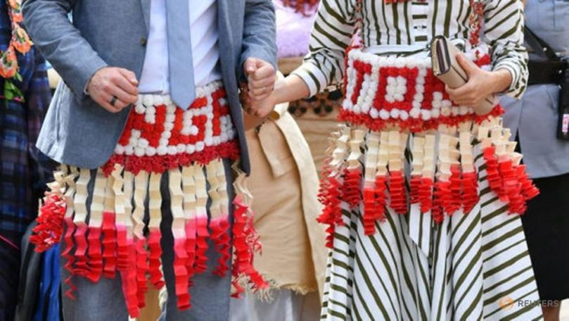 Harry and Meghan don Tongan dress as they bid farewell to Pacific Islands