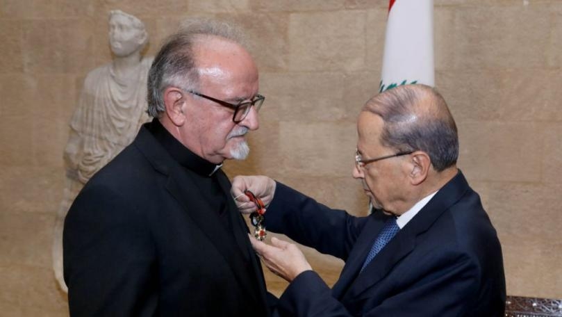 Aoun awards Father Mubarak National Order of the Cedar in honor of his work
