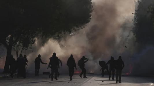 Greek youths march to mark anniversary of police shooting of teenager