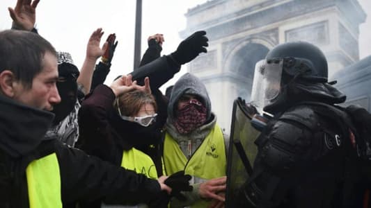 Nearly 300 detained as Paris braces for 'yellow vest' protests