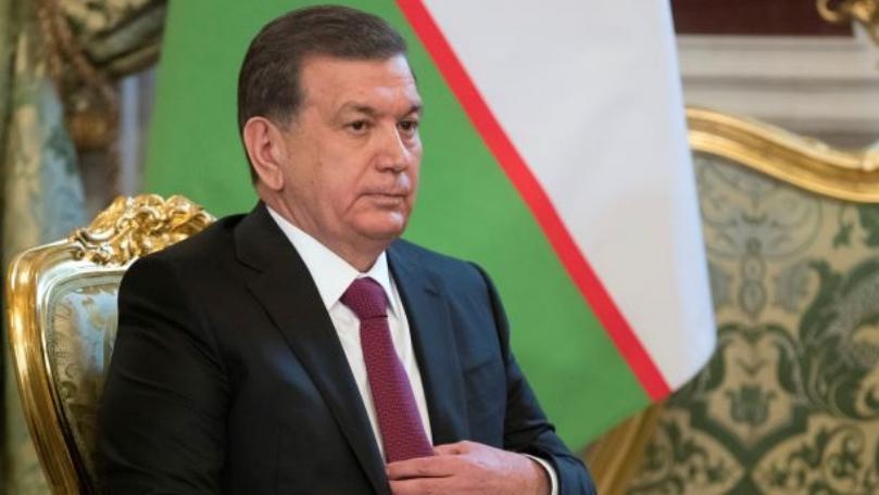Cleric flees Uzbekistan after Muslim headscarf row