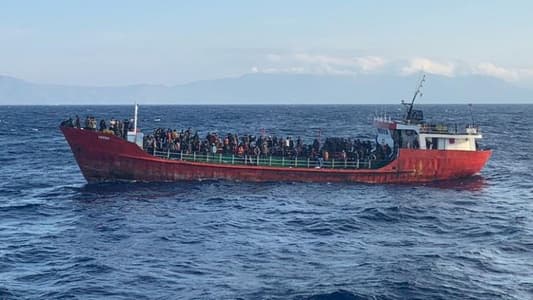 Ship with hundreds of Afghan migrants docks at Greek port