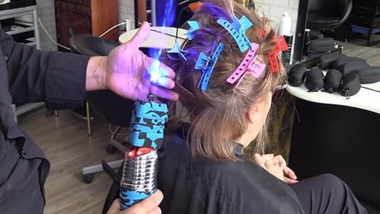 Spanish Barber Gives ‘Star Wars’ Hairdos Using a ‘Light Saber’ Laser