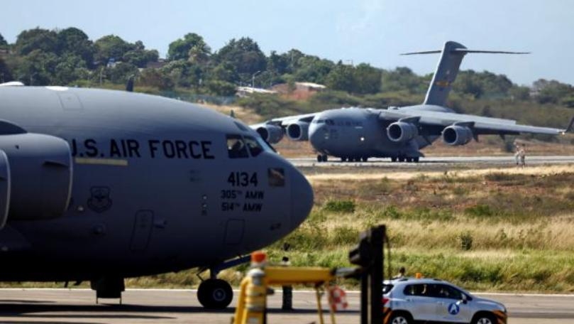 More U.S. aid for Venezuela touches down amid distribution uncertainty