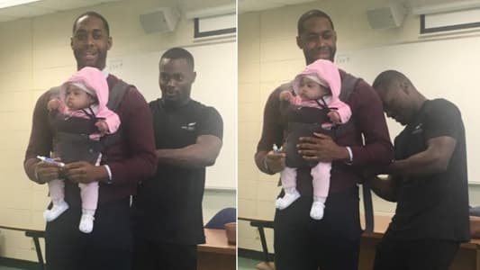 Professor Holds Student's Baby So He Can Focus in Class