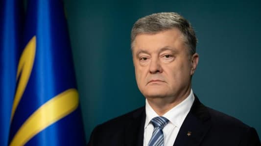 Ukraine's outgoing and new presidents denounce Russia over east Ukraine passports