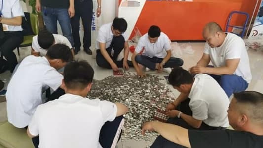 Chinese Woman Buys a £21,000 Volkswagen With 66 Bags of Coins