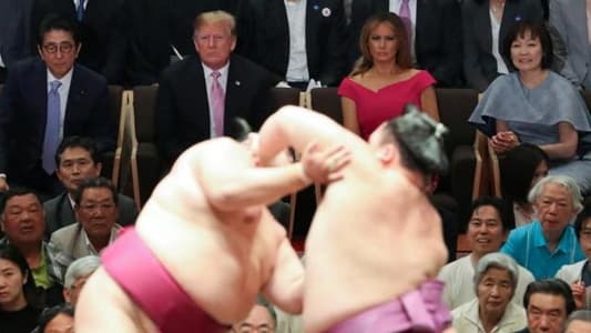 Trump watches 'incredible' sumo wrestling in Japan