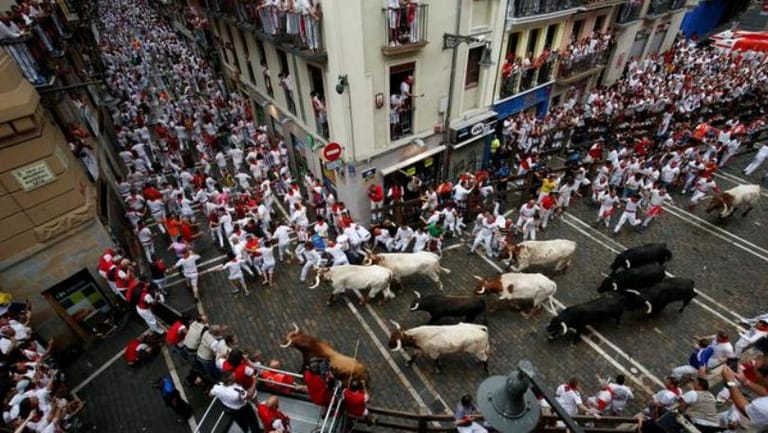 Three people gored on first day of Spanish bull-running festival