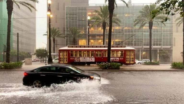 Heavy rains flood New Orleans streets in taste of storm ahead