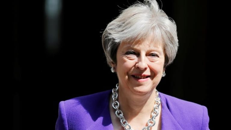 May says Trump's congresswomen tweets 'completely unacceptable'