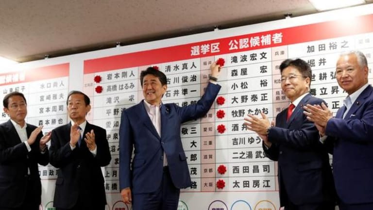 Japan's Abe says will make every effort to reduce tension with Iran