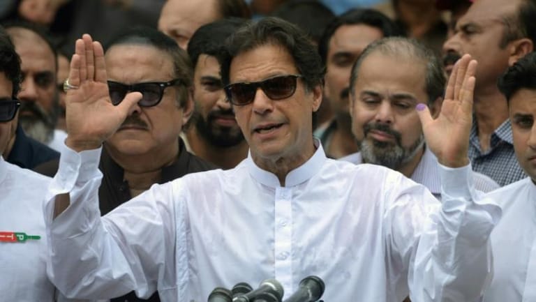 Pakistan Prime Minister Khan says he will try to persuade Taliban to meet Afghan government