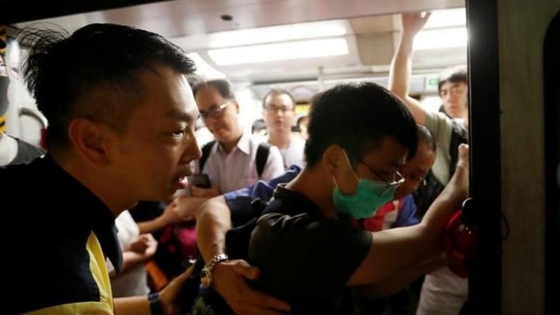 Strike grips Hong Kong as leader warns protests challenge China's sovereignty